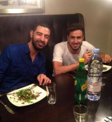 Nacer Chadli having dinner with his brother at his mansion.
